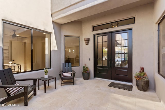 property entrance featuring french doors