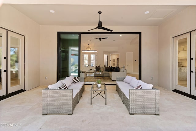 view of patio / terrace with ceiling fan, french doors, and an outdoor living space