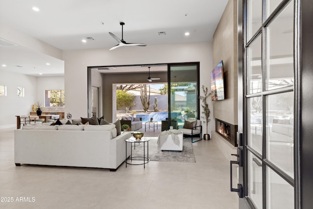 living room featuring ceiling fan