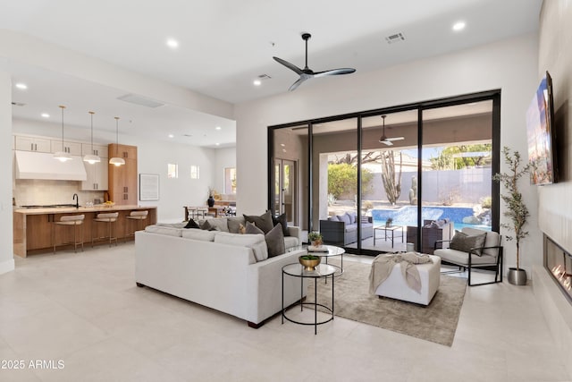 living room with ceiling fan