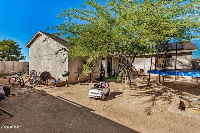 exterior space featuring a trampoline