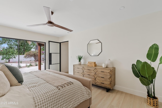 bedroom with access to outside, light wood-type flooring, a ceiling fan, and baseboards