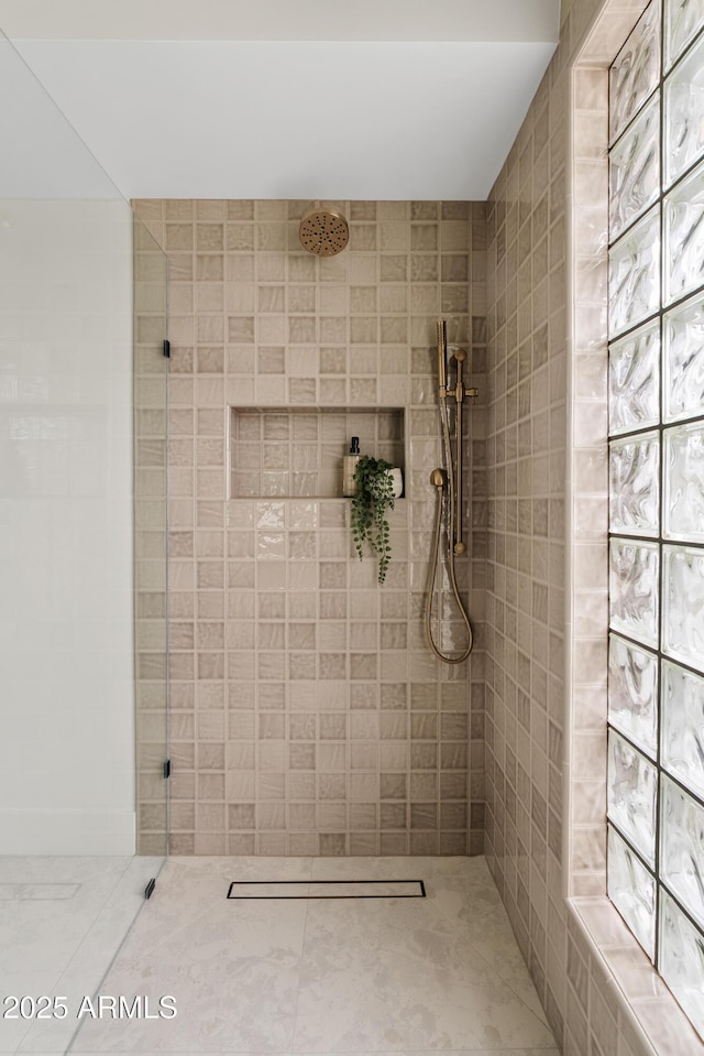 bathroom featuring walk in shower