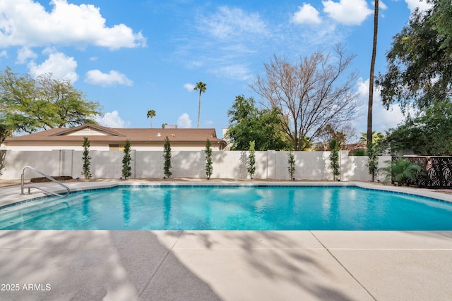 view of pool with a patio, fence, and a fenced in pool