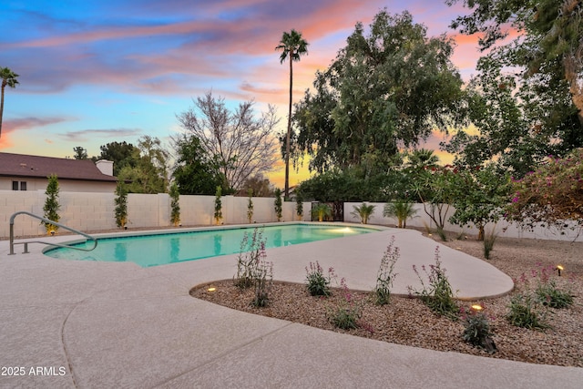 view of pool featuring a fenced in pool, a patio area, and a fenced backyard