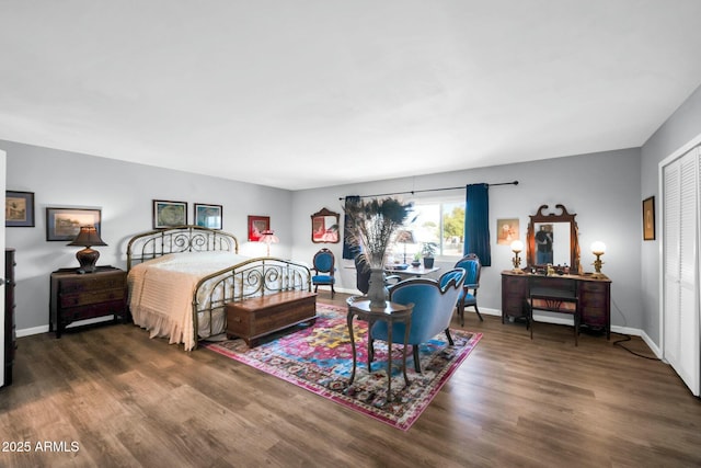 1924 W Belmont Ave, Phoenix, AZ 85021 - bedroom featuring baseboards, wood finished floors, and a closet