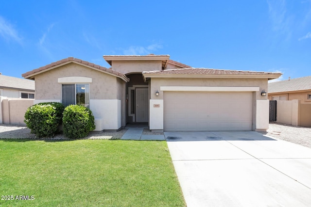 view of front facade featuring a garage and a front yard