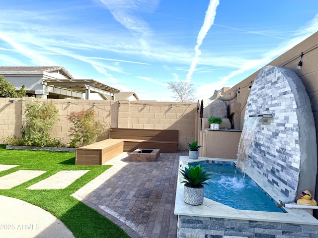 view of patio / terrace featuring pool water feature