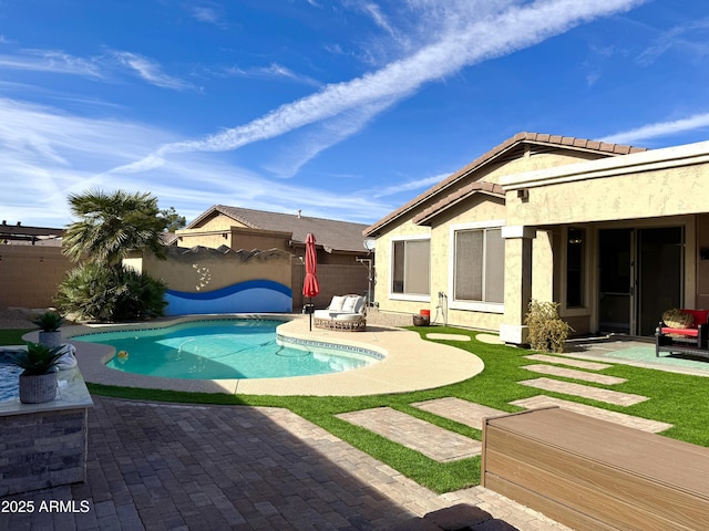 view of pool featuring a patio area