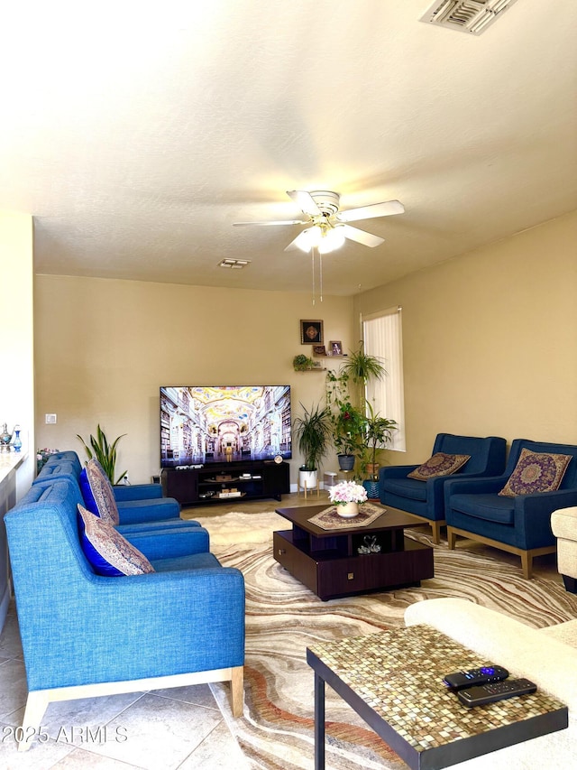 living room featuring ceiling fan