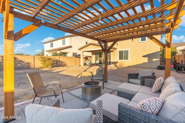 view of patio featuring an outdoor hangout area and a pergola