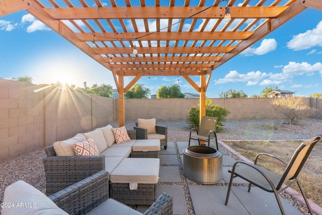 view of patio featuring an outdoor living space and a pergola