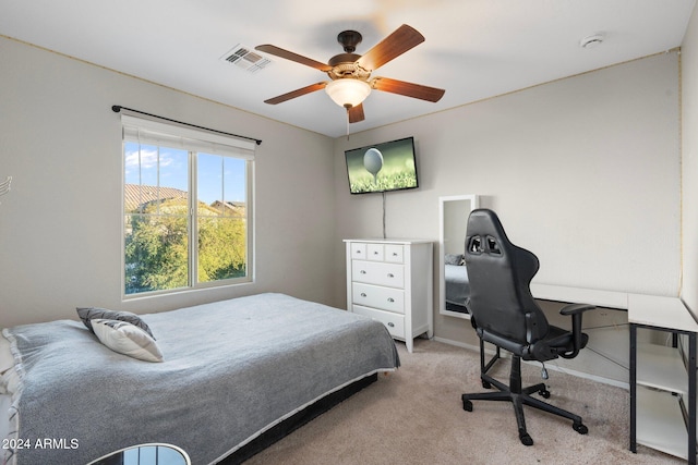 carpeted bedroom with ceiling fan