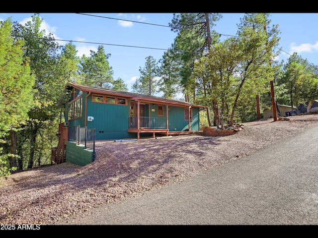 6869 W Ute Trl, Pine, AZ 85544 - rustic home featuring covered porch