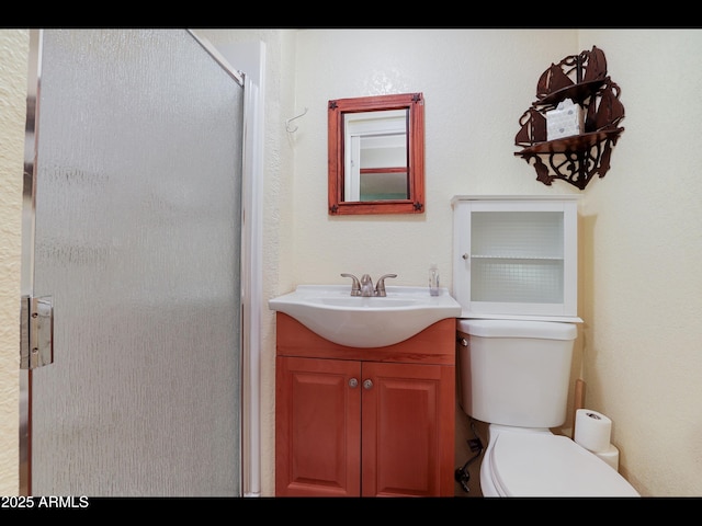 6869 W Ute Trl, Pine, AZ 85544 - bathroom with toilet, a stall shower, and vanity