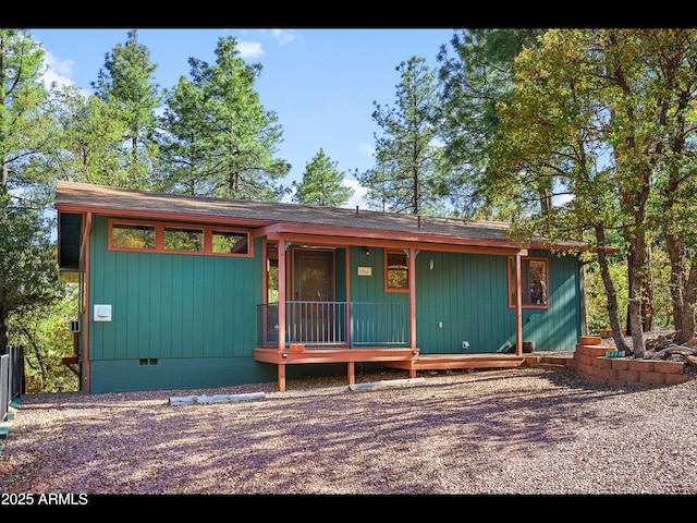 6869 W Ute Trl, Pine, AZ 85544 - view of front of property with crawl space, a porch, and a shingled roof