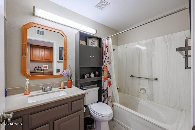 full bathroom featuring vanity, shower / bath combo, and toilet