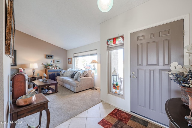 tiled living room with vaulted ceiling