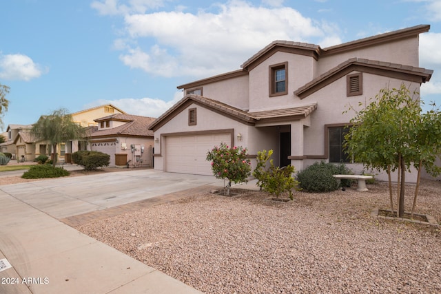 view of front of home with a garage