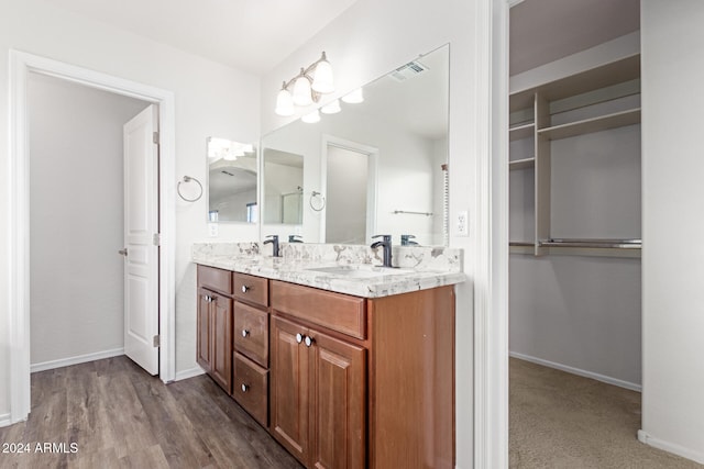 bathroom featuring hardwood / wood-style floors and vanity