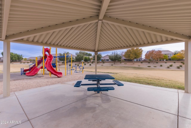 view of patio featuring a playground