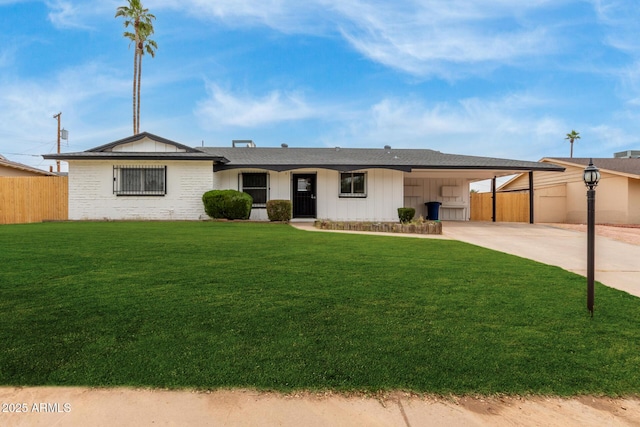 1515 N Saguaro Dr, Tempe, AZ 85288 - ranch-style home featuring driveway, an attached carport, board and batten siding, and roof with shingles