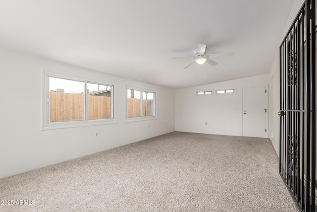 1515 N Saguaro Dr, Tempe, AZ 85288 - carpeted spare room featuring ceiling fan and vaulted ceiling
