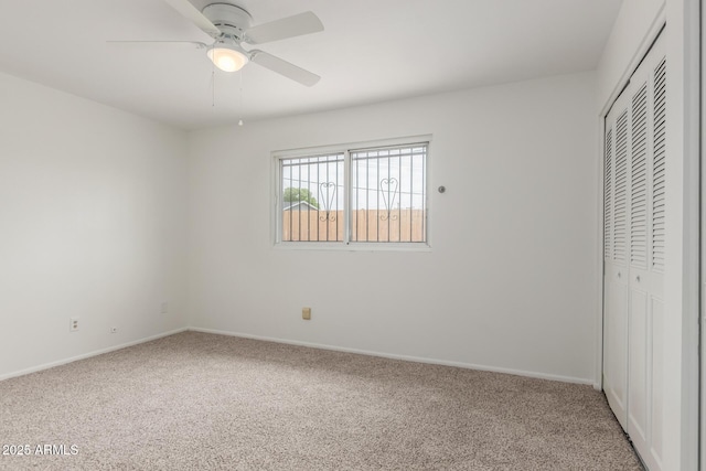 1515 N Saguaro Dr, Tempe, AZ 85288 - unfurnished bedroom featuring carpet, a closet, baseboards, and a ceiling fan
