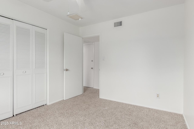 1515 N Saguaro Dr, Tempe, AZ 85288 - unfurnished bedroom featuring carpet flooring, a closet, and baseboards