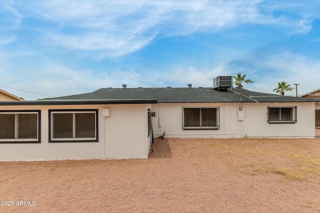 1515 N Saguaro Dr, Tempe, AZ 85288 - rear view of property featuring central air condition unit and roof with shingles