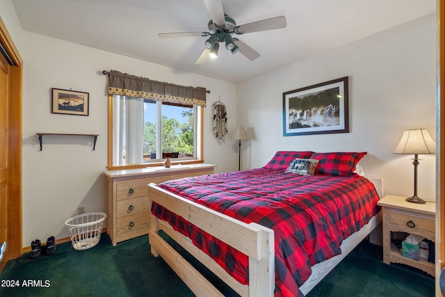 carpeted bedroom featuring ceiling fan