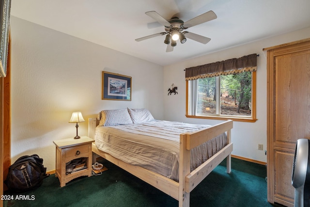 carpeted bedroom with ceiling fan