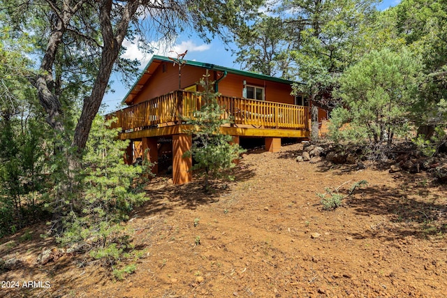 rear view of house with a deck