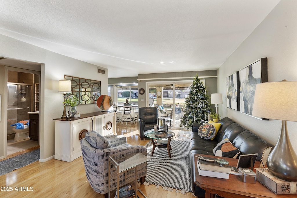 living room featuring light wood-type flooring