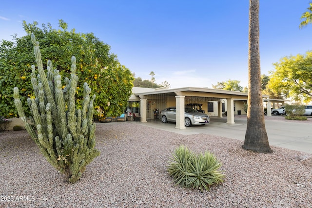 view of car parking featuring a carport