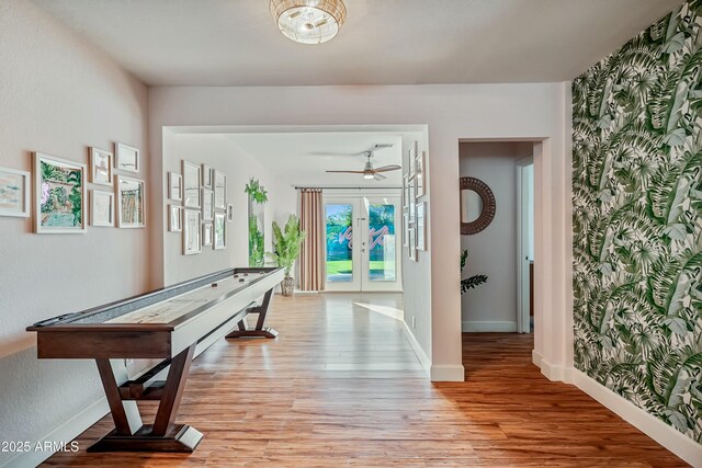 4036 N 40th Pl, Phoenix, AZ 85018 - recreation room with light wood-type flooring, french doors, and a ceiling fan