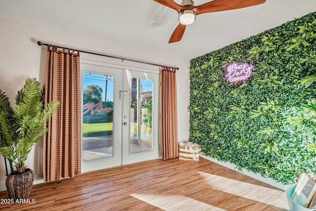 4036 N 40th Pl, Phoenix, AZ 85018 - unfurnished room featuring wood finished floors and a ceiling fan