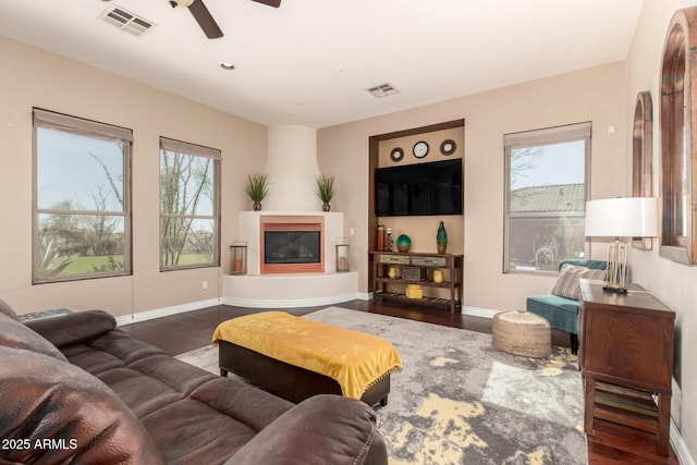9753 E Suncrest Rd, Scottsdale, AZ 85262 - living area with healthy amount of natural light, wood finished floors, and recessed lighting
