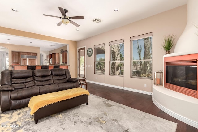 9753 E Suncrest Rd, Scottsdale, AZ 85262 - living room with wood finished floors, a ceiling fan, recessed lighting, arched walkways, and baseboards