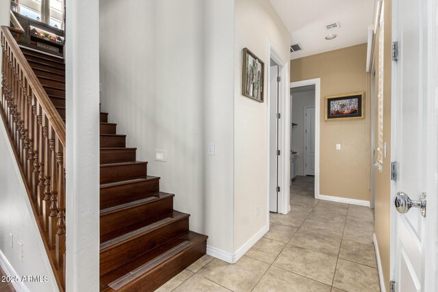 9753 E Suncrest Rd, Scottsdale, AZ 85262 - stairway with tile patterned floors and baseboards