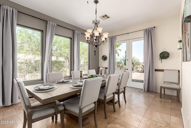 9753 E Suncrest Rd, Scottsdale, AZ 85262 - dining area with a chandelier, light tile patterned floors, and french doors