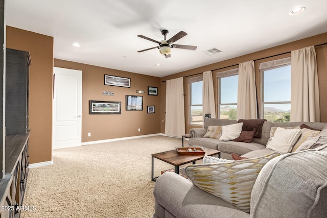 9753 E Suncrest Rd, Scottsdale, AZ 85262 - living room with light colored carpet, ceiling fan, baseboards, and recessed lighting