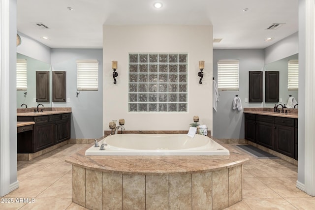 9753 E Suncrest Rd, Scottsdale, AZ 85262 - bathroom with a garden tub, two vanities, tile patterned flooring, and recessed lighting