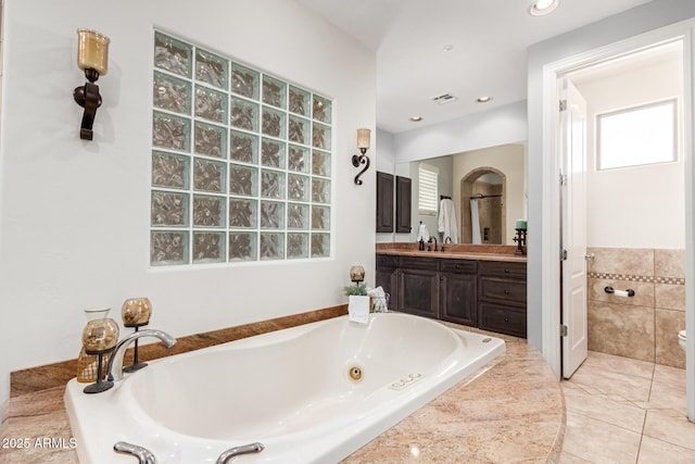 9753 E Suncrest Rd, Scottsdale, AZ 85262 - full bath with a whirlpool tub, vanity, toilet, recessed lighting, and tile patterned flooring
