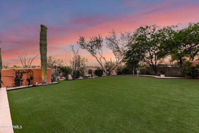 9753 E Suncrest Rd, Scottsdale, AZ 85262 - yard at dusk with a putting green