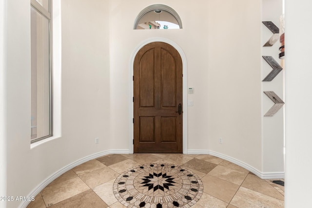 9753 E Suncrest Rd, Scottsdale, AZ 85262 - foyer entrance featuring arched walkways and baseboards