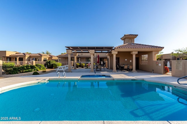 pool featuring a patio and fence