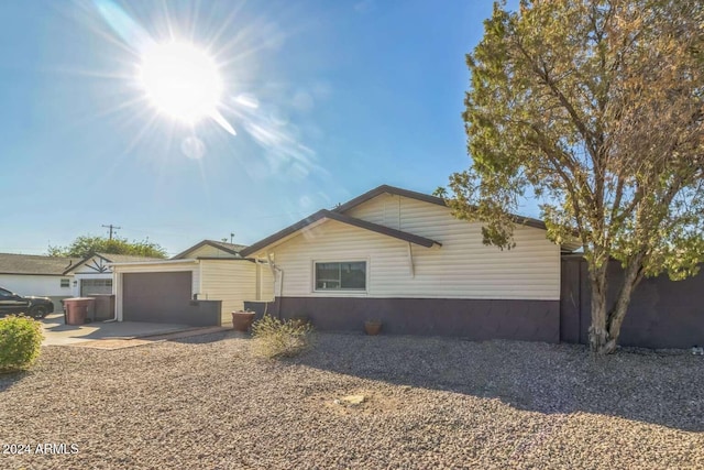 single story home with a garage