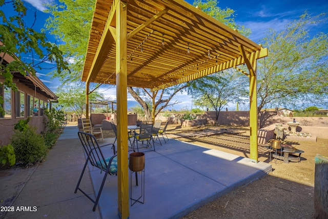 view of patio / terrace featuring outdoor dining space and a fenced backyard