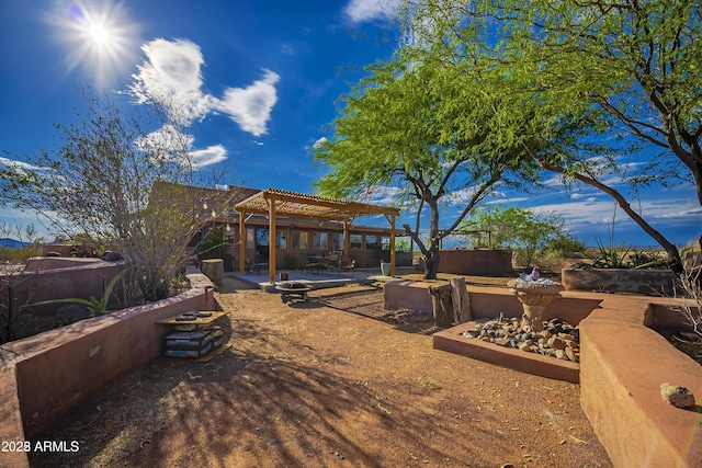 view of yard featuring a pergola and a patio area